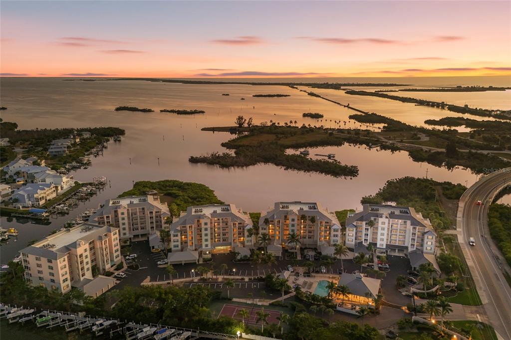 13113 Gasparilla Road, Unit 503 Placida, FL 33946 - Photo 2 of 87 a view of a city and ocean view