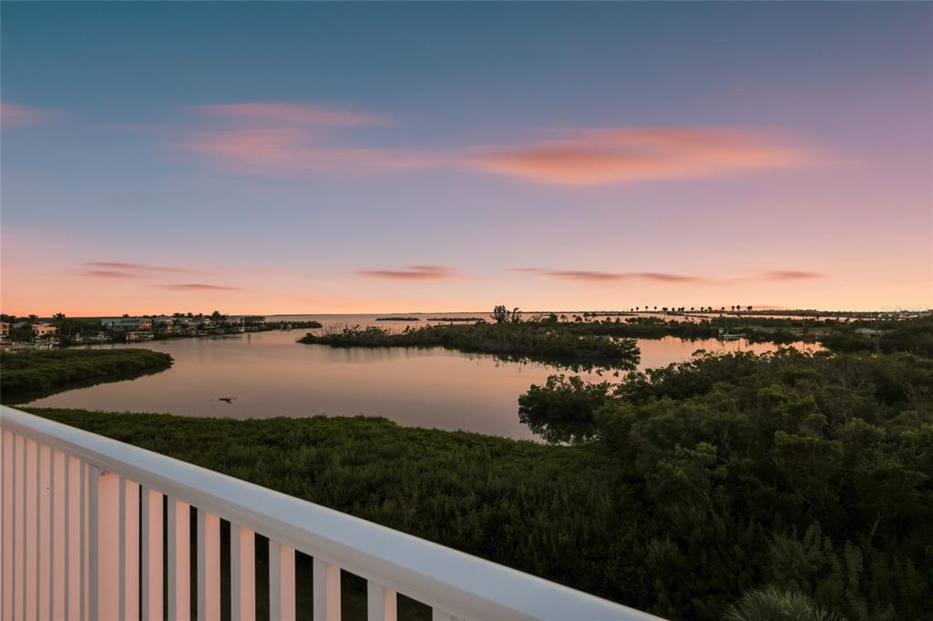 13113 Gasparilla Road, Unit 503 Placida, FL 33946 - Photo 23 of 87 a view of a lake from a balcony