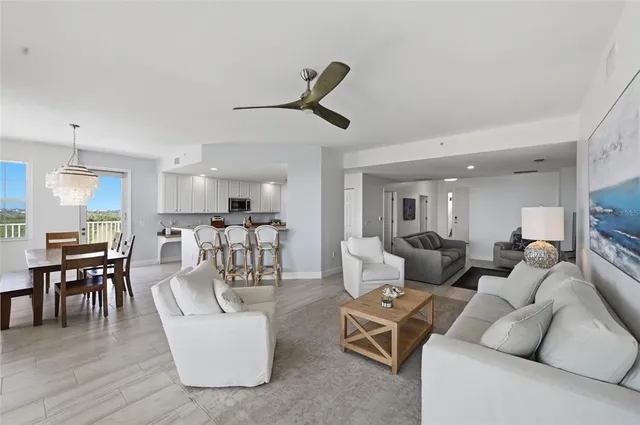 an aerial view of a house with a yard and garden