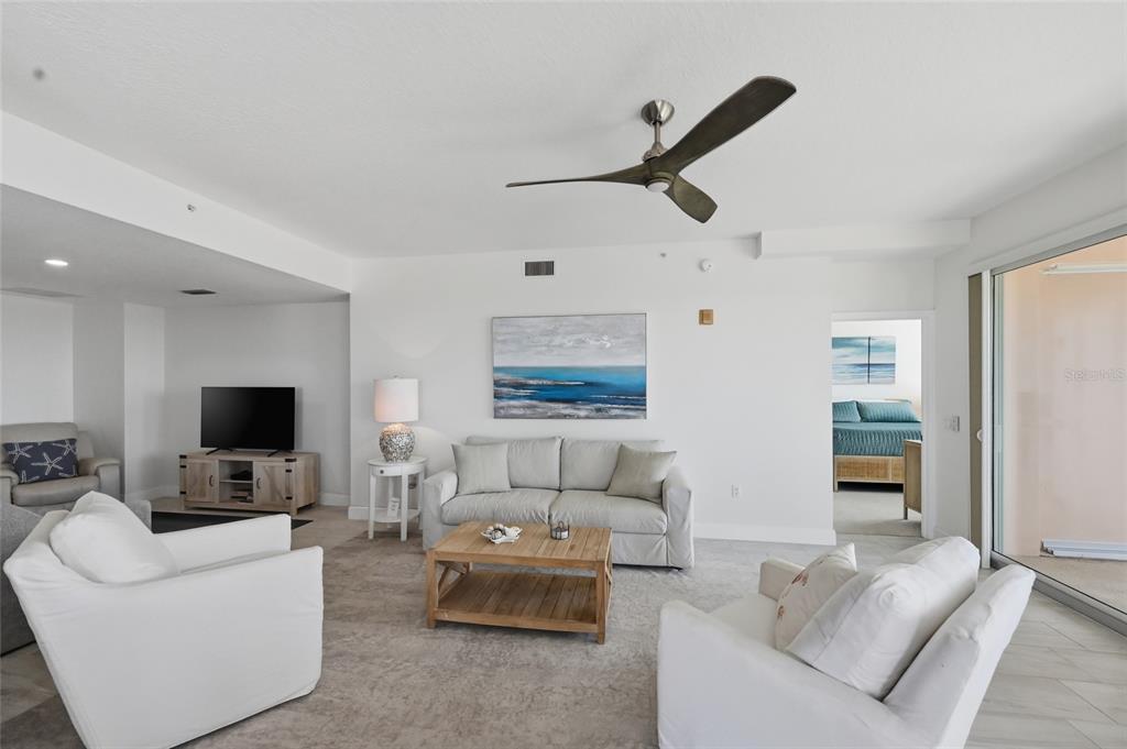 13113 Gasparilla Road, Unit 503 Placida, FL 33946 - Photo 52 of 87 a living room with furniture and a flat screen tv