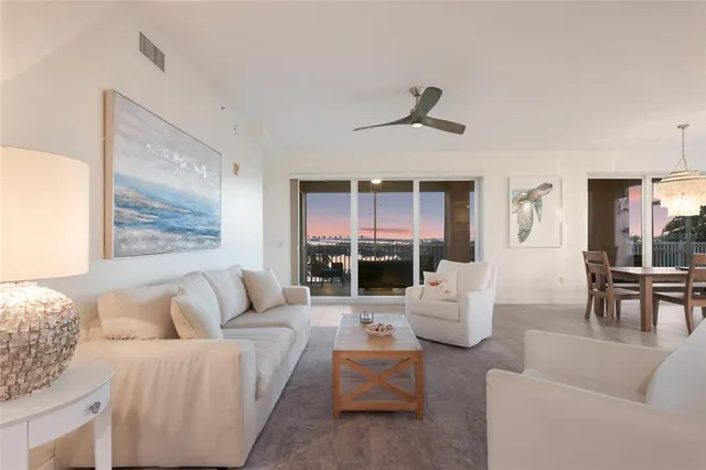 a kitchen with a sink stove top oven and refrigerator
