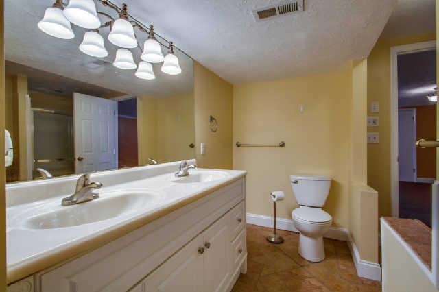 511 Colice Jeanne Road Nashville, TN 37221 - Photo 16 of 20 Spacious tiled master bath recently renovated with double vanity and two linen closets