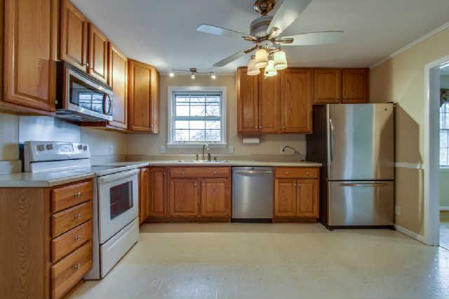 511 Colice Jeanne Road Nashville, TN 37221 - Photo 8 of 20 Another open view into the back yard from the kitchen