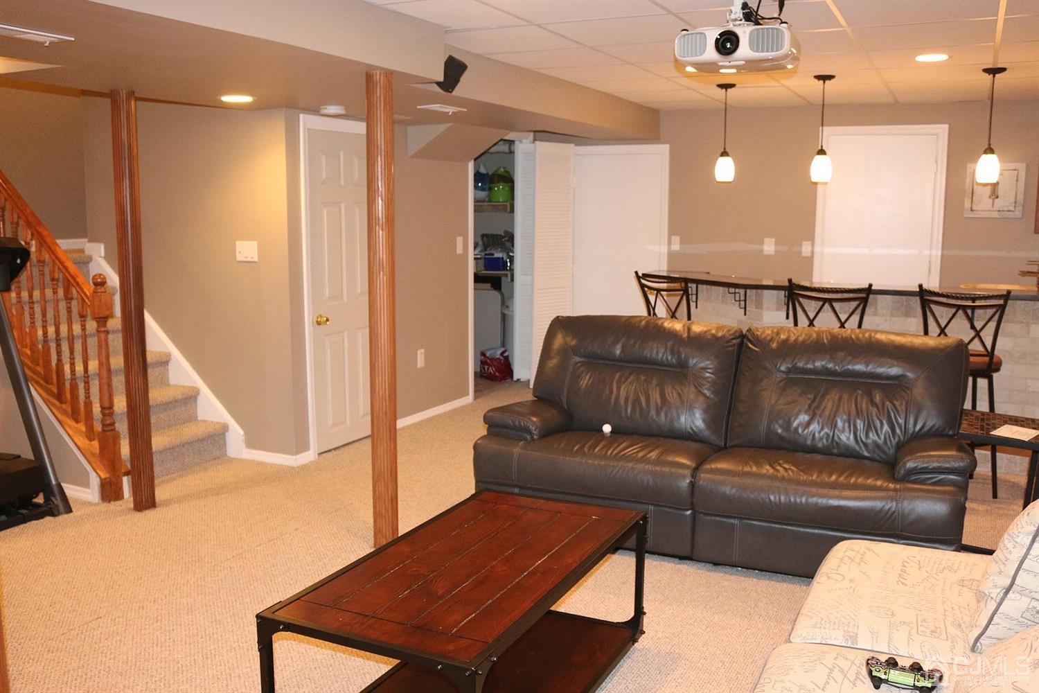 354 Hawthorne Road North Brunswick, NJ 08902 - Photo 3 of 9 a view of a livingroom with furniture and a couch