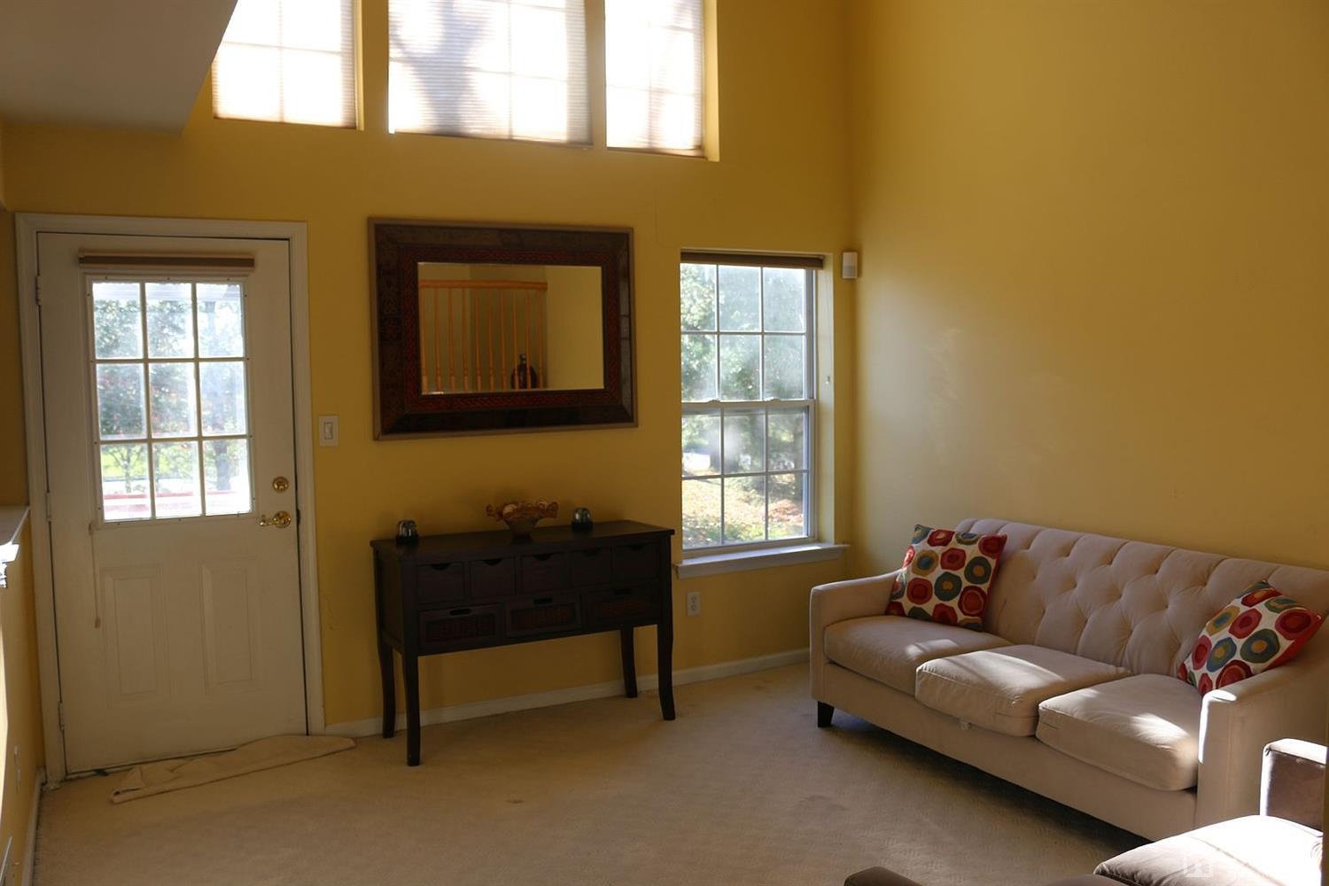 354 Hawthorne Road North Brunswick, NJ 08902 - Photo 5 of 9 a living room with furniture and a window