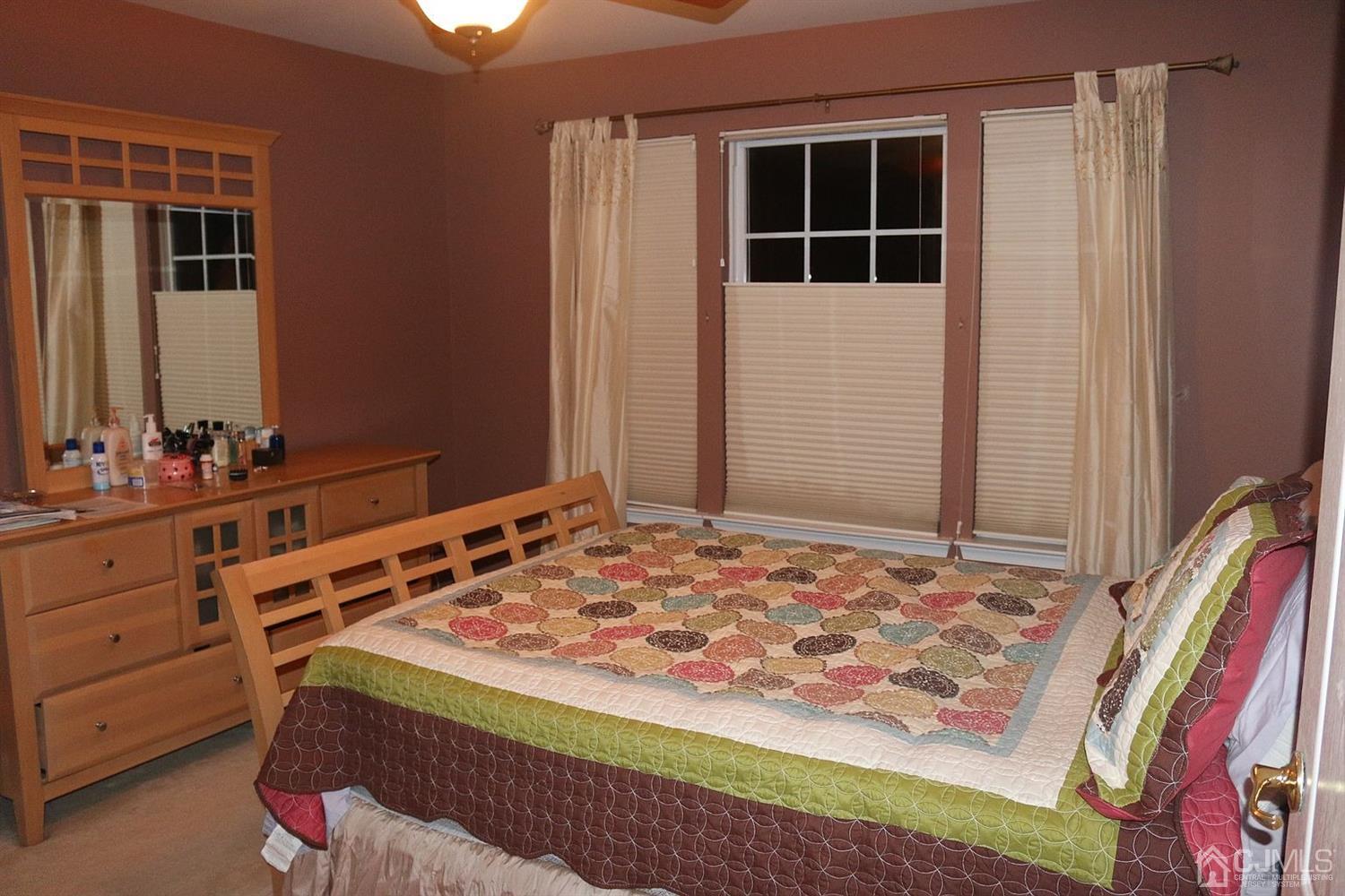 354 Hawthorne Road North Brunswick, NJ 08902 - Photo 8 of 9 a bedroom with a bed and a window