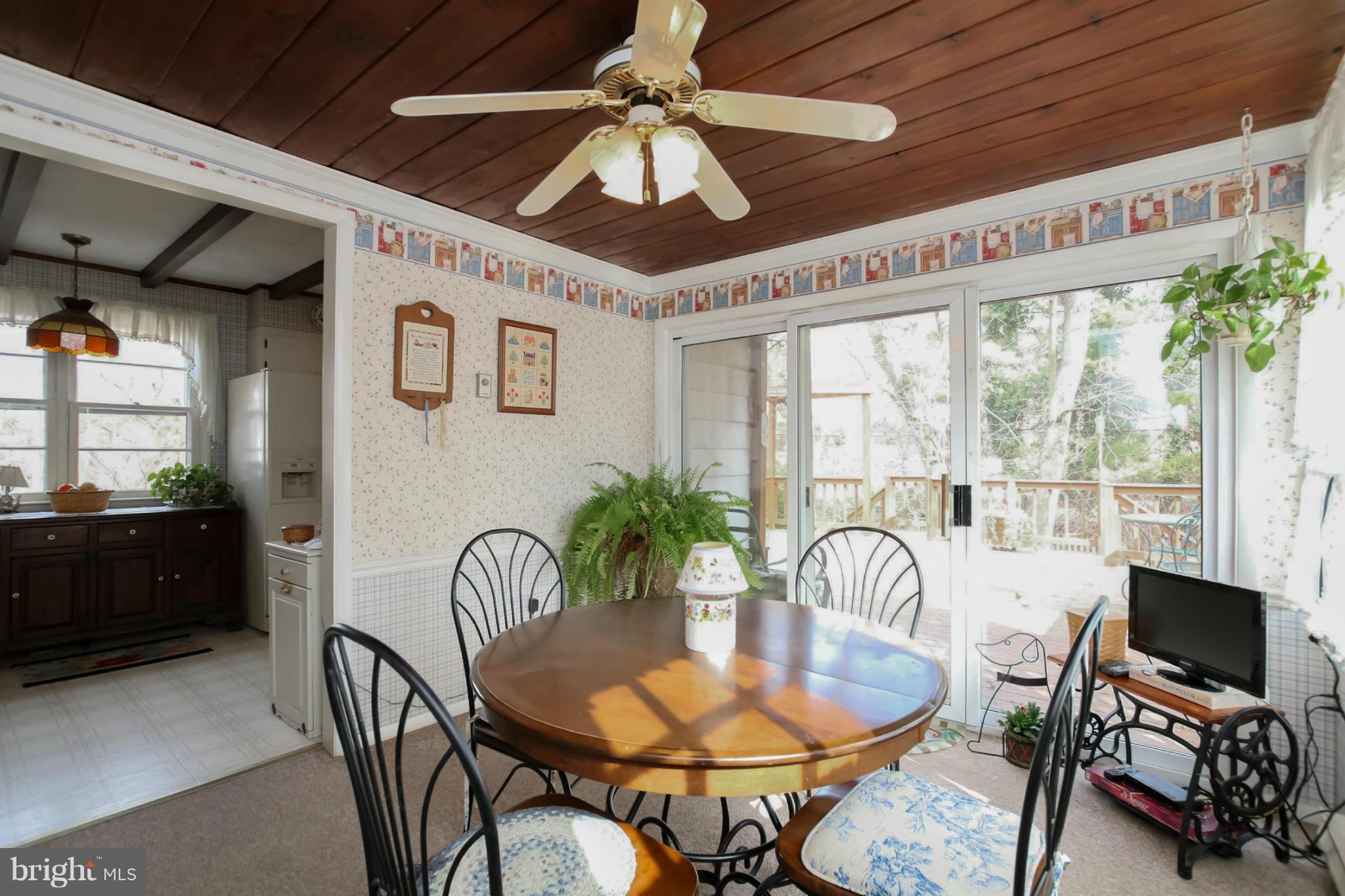 6631 Loch Hill Road Baltimore, MD 21239 - Photo 14 of 30 Breakfast Room w/sliders to spacious deck