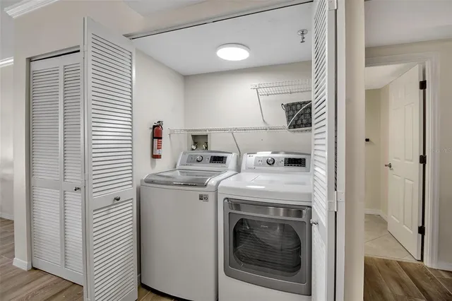 a utility room with dryer and washer