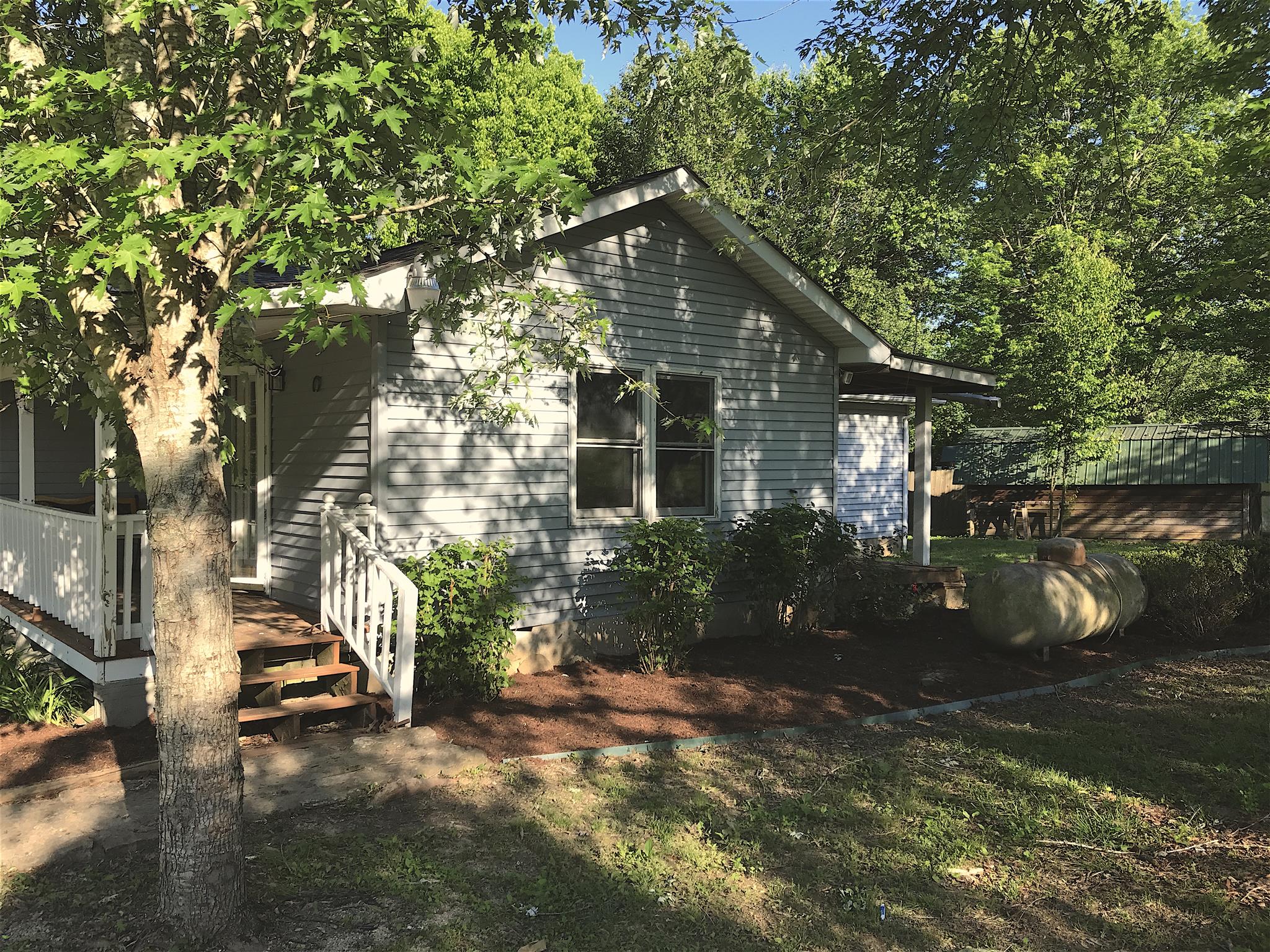 3996 Fairview Road Columbia, TN 38401 - Photo 14 of 18 a view of a house with a yard