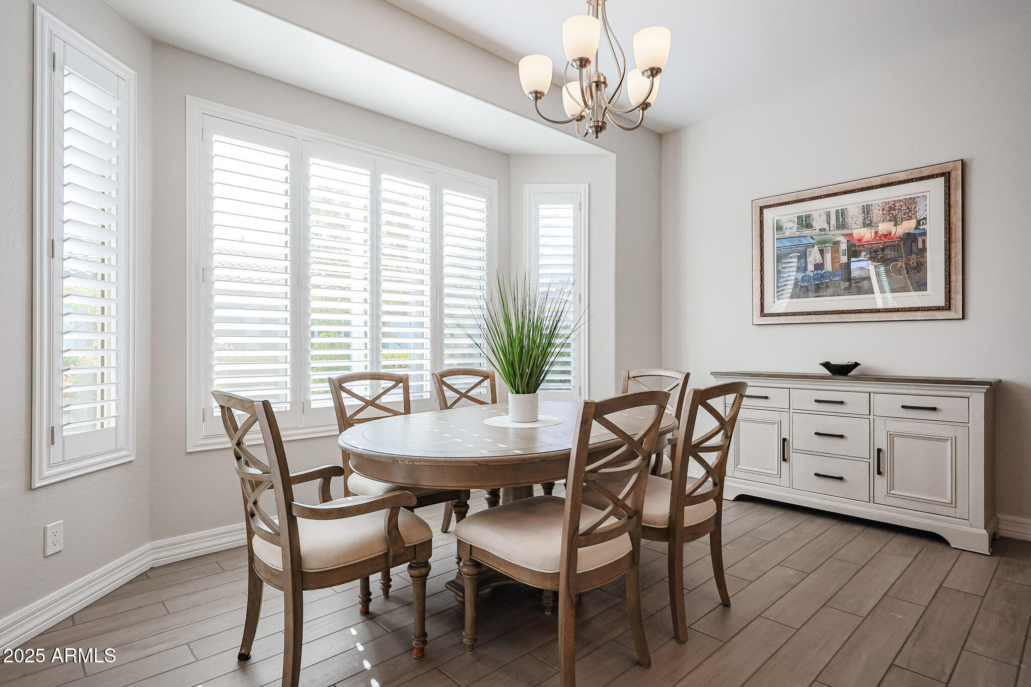 17885 West Ashurst Drive Goodyear, AZ 85338 - Photo 11 of 63 a dining room with furniture and window