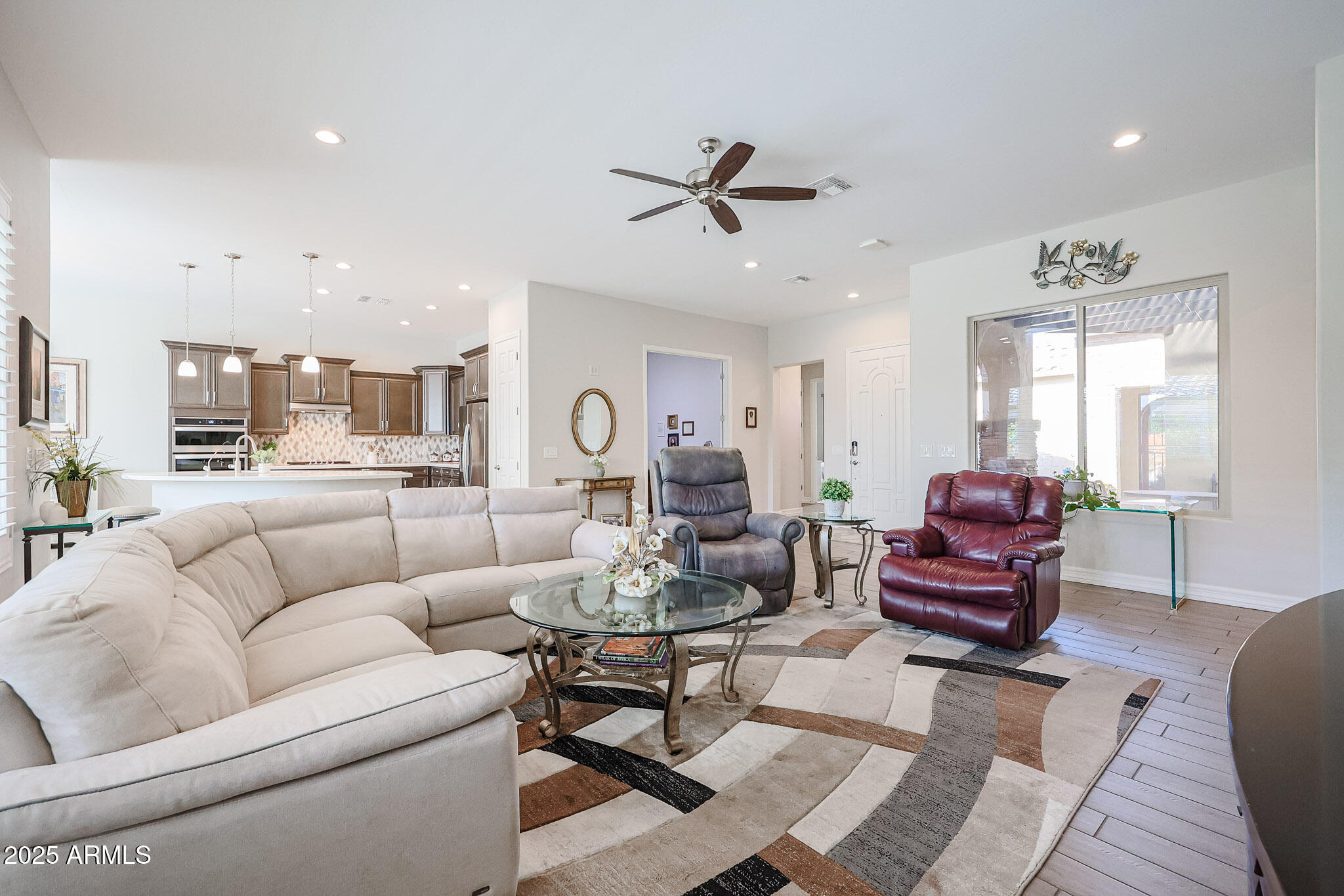 17885 West Ashurst Drive Goodyear, AZ 85338 - Photo 19 of 63 a living room with furniture