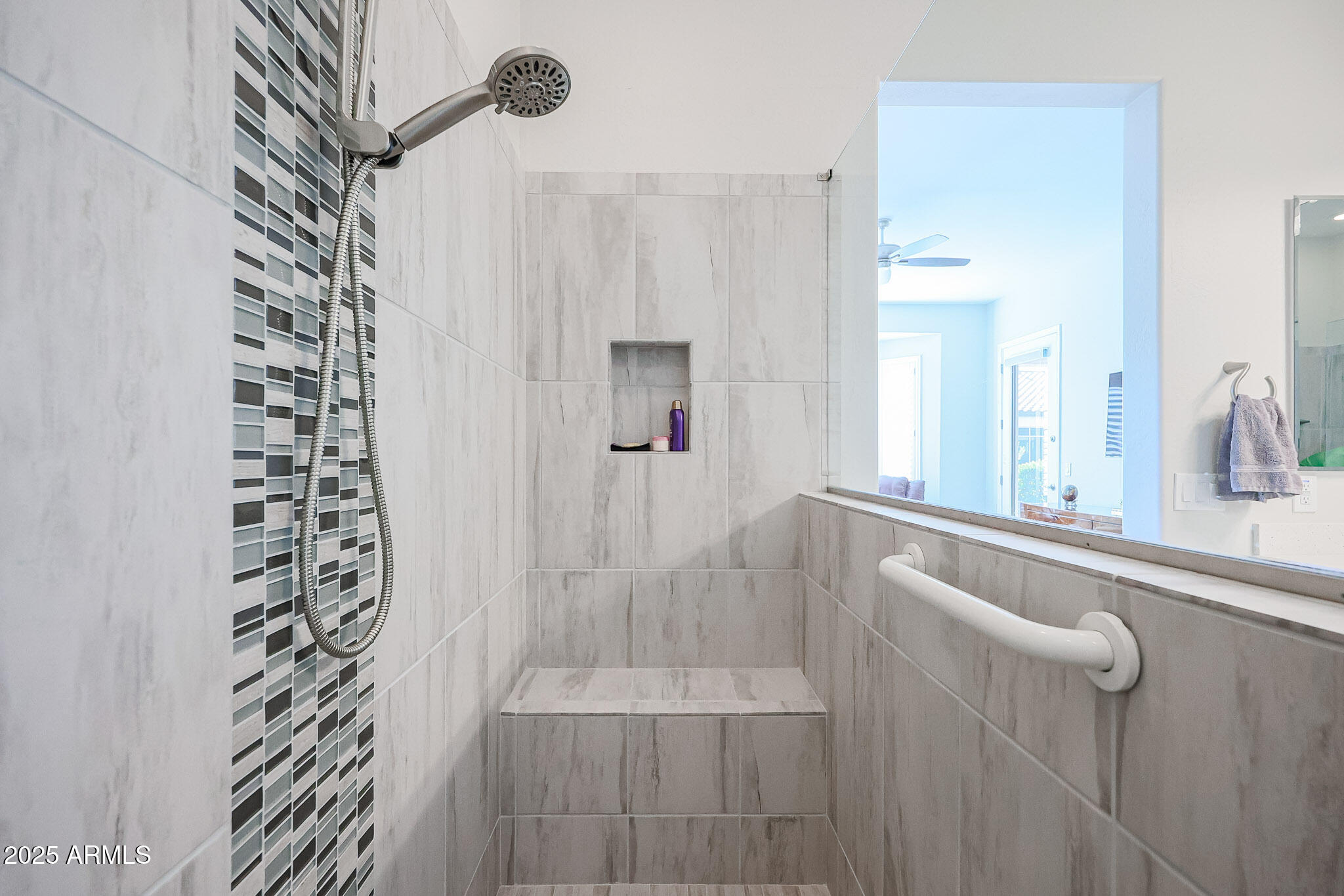 17885 West Ashurst Drive Goodyear, AZ 85338 - Photo 26 of 63 a bathroom with a shower