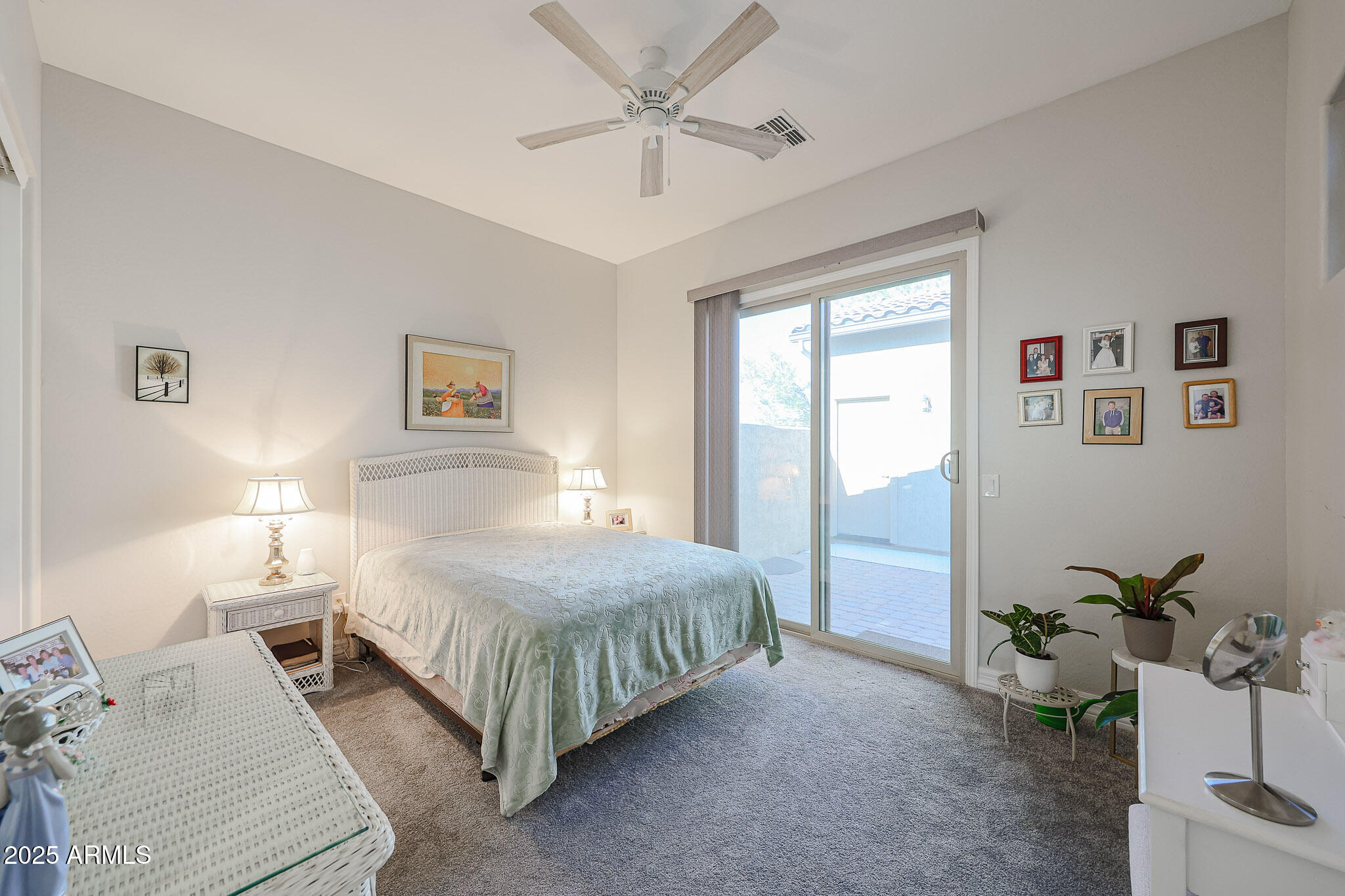 17885 West Ashurst Drive Goodyear, AZ 85338 - Photo 28 of 63 a bedroom with a bed furniture and a window
