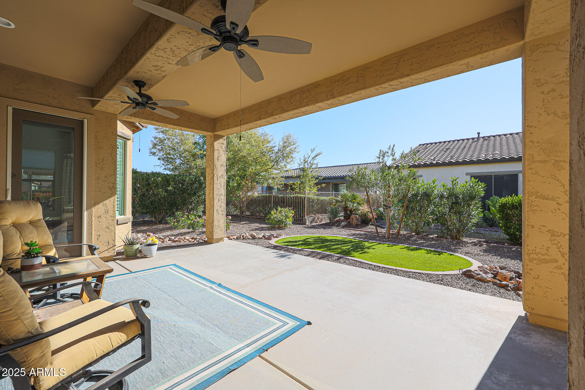 17885 West Ashurst Drive Goodyear, AZ 85338 - Photo 33 of 63 a view of swimming pool with seating area and furniture