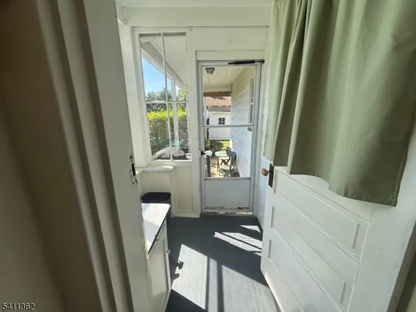 a bathroom with a bathtub and a toilet