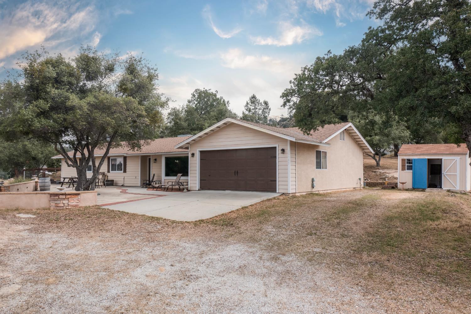 29395 Revis Road Coarsegold, CA 93614 - Photo 32 of 32 a view of a house with a yard