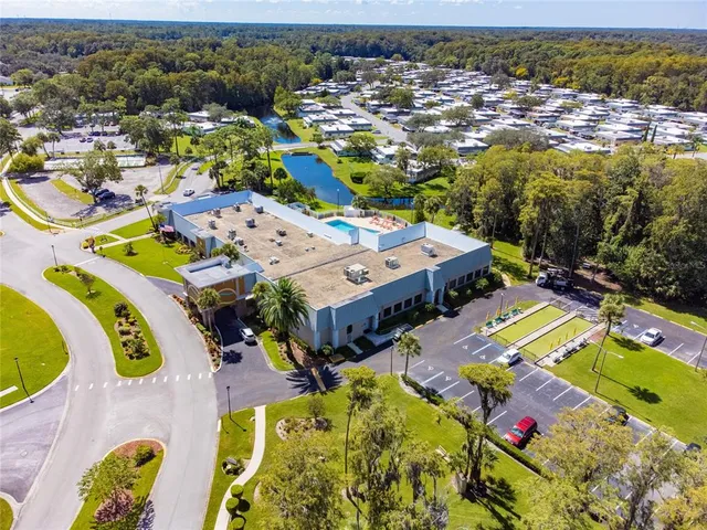 an aerial view of a swimming pool patio and mountain view