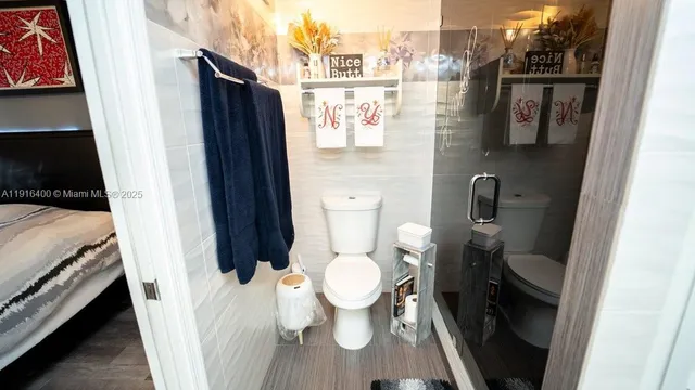 a bathroom with a toilet and a sink