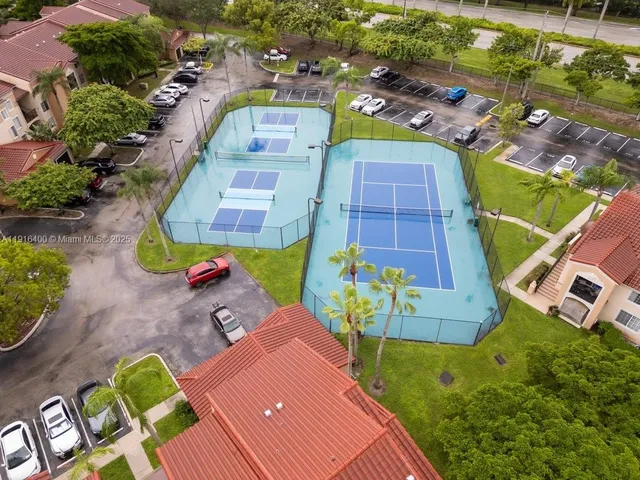 an aerial view of a house with a garden