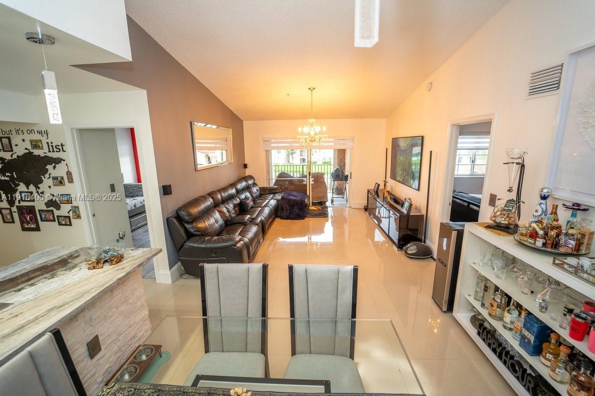 The Enclave at Miramar Miramar, FL 33025 - Photo 4 of 23 a view of a living room and dining room