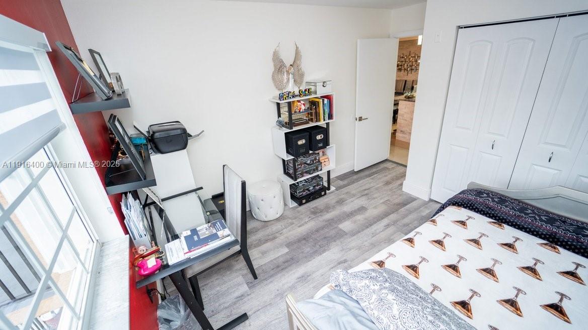 The Enclave at Miramar Miramar, FL 33025 - Photo 10 of 23 a view of an entryway with wooden floor