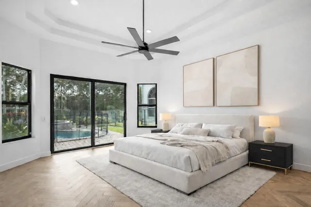 a bath tub sitting next to a window