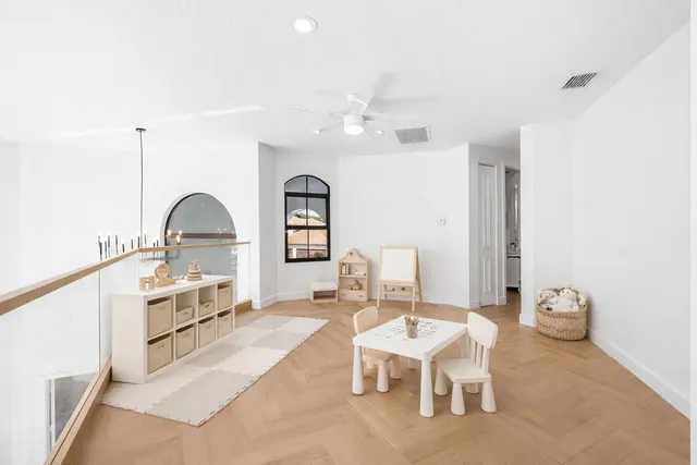 a room with gym equipment and a window