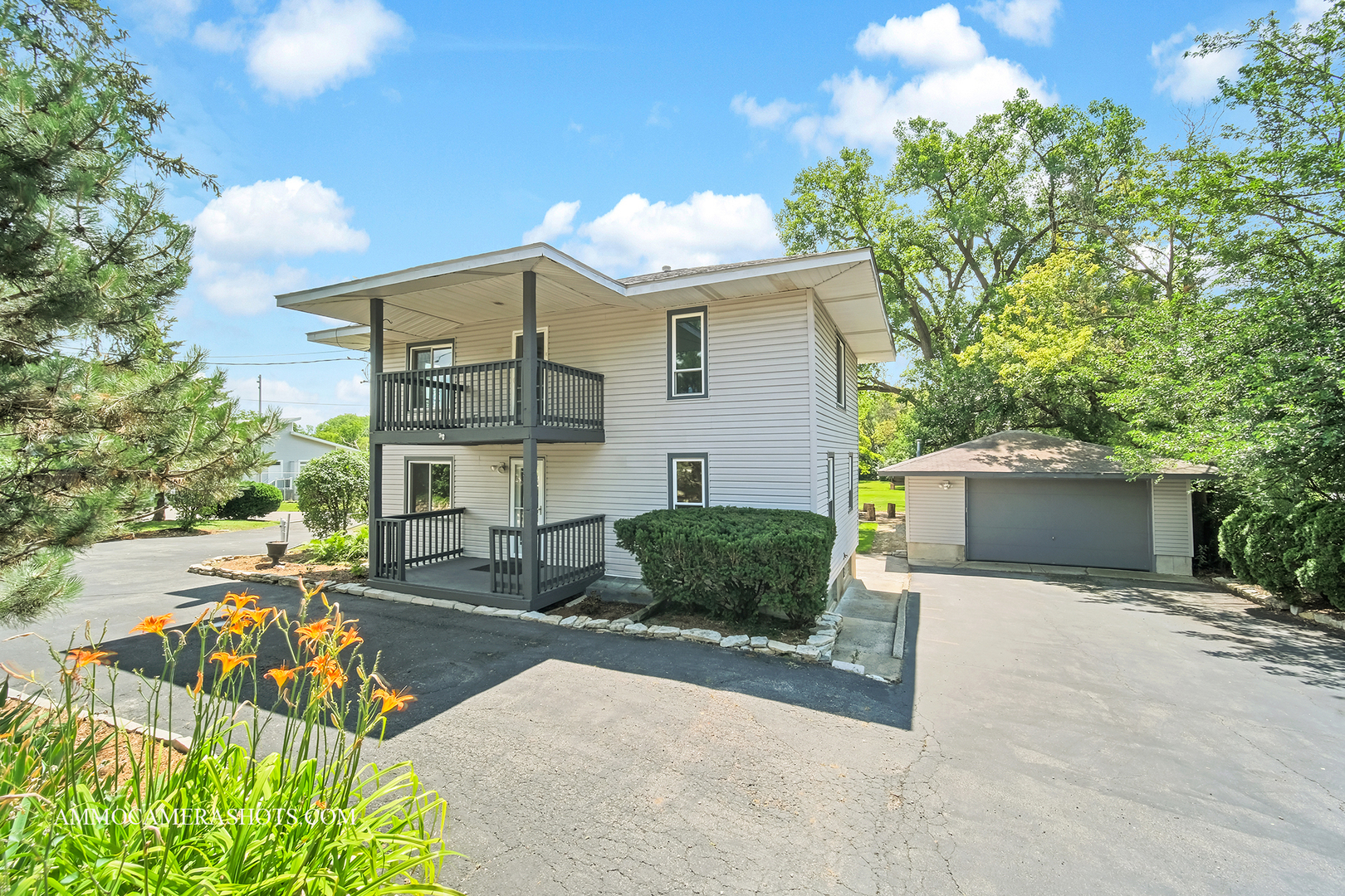 25W375 Plank Road Naperville, IL 60563 - Photo 1 of 47 a front view of a house with a yard