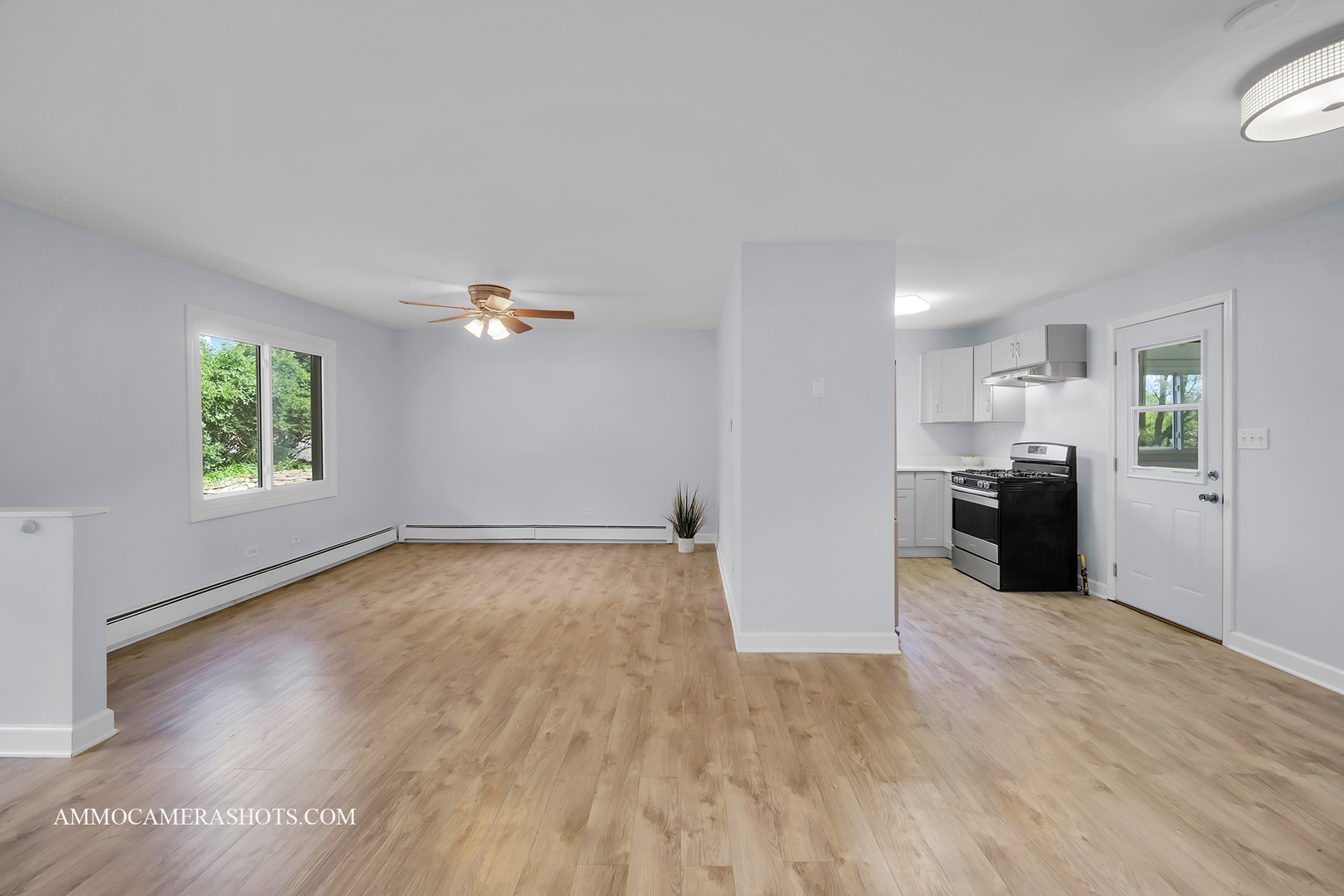 25W375 Plank Road Naperville, IL 60563 - Photo 16 of 47 wooden floor in an empty room with a window