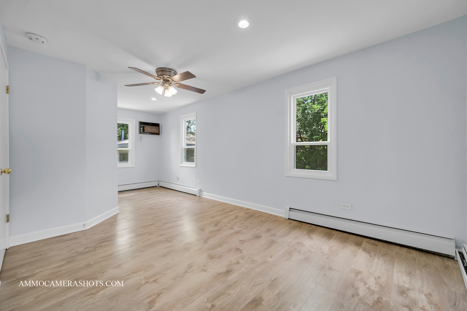 25W375 Plank Road Naperville, IL 60563 - Photo 22 of 47 wooden floor in an empty room with a window
