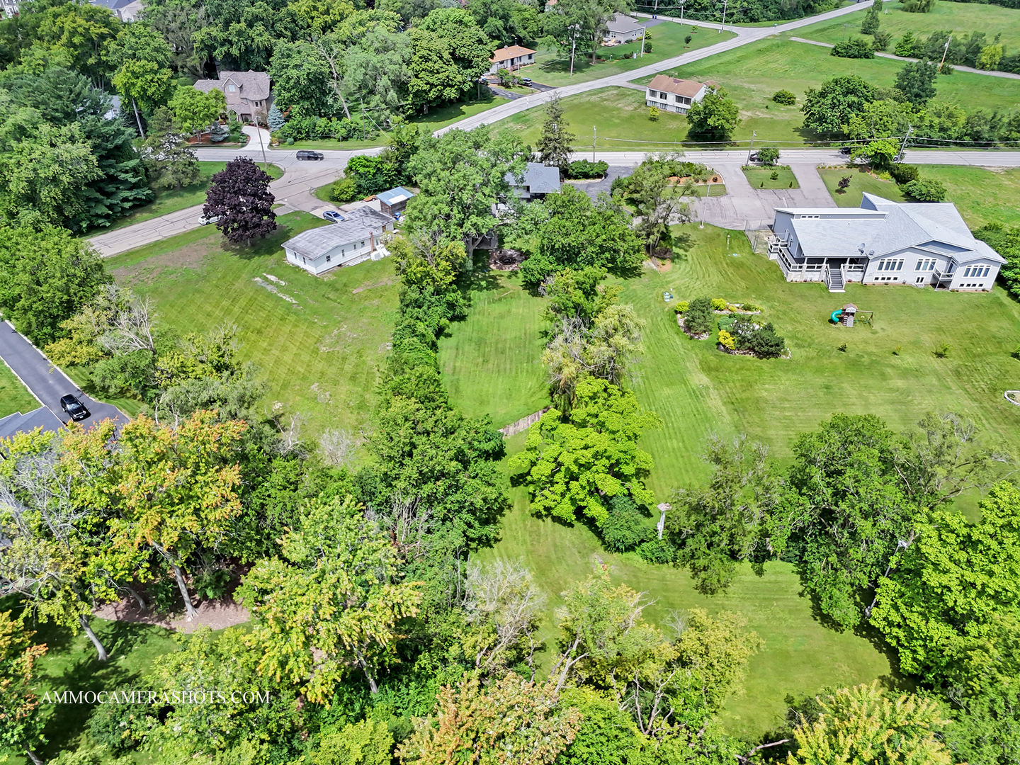 25W375 Plank Road Naperville, IL 60563 - Photo 37 of 47 an aerial view of residential house with outdoor space and trees all around