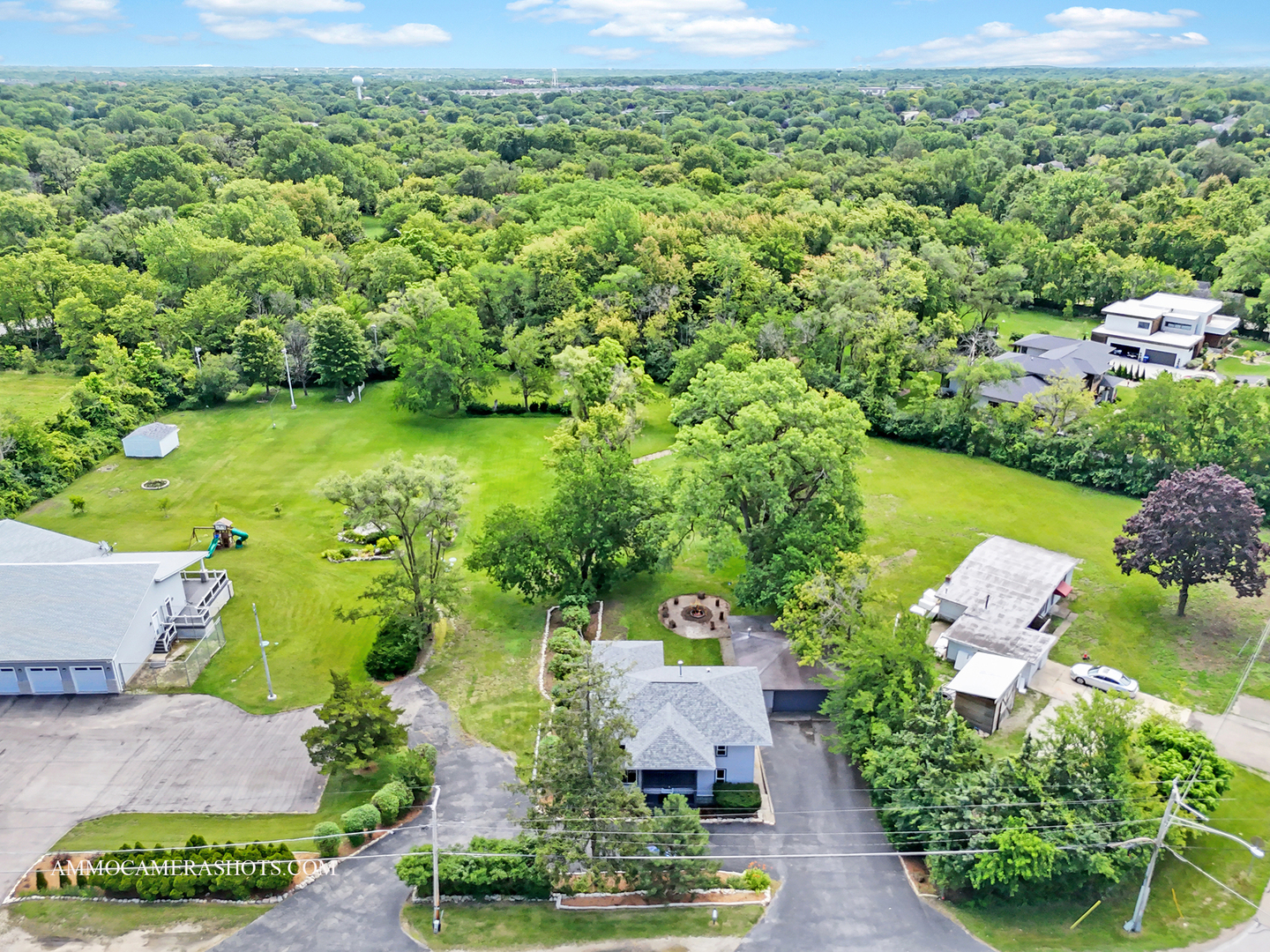 25W375 Plank Road Naperville, IL 60563 - Photo 39 of 47 an aerial view of a house with garden space and outdoor seating