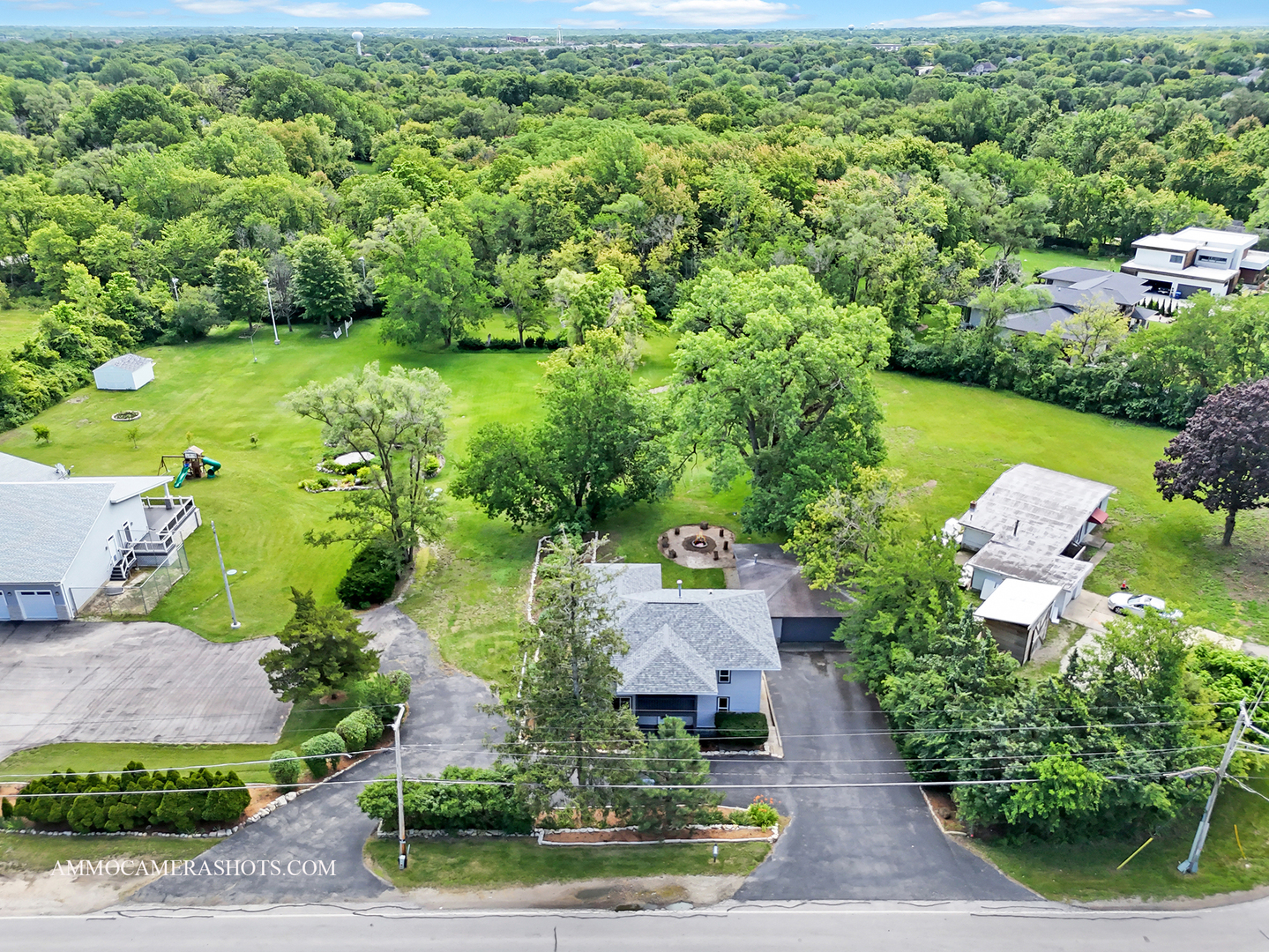 25W375 Plank Road Naperville, IL 60563 - Photo 41 of 47 an aerial view of a house with yard swimming pool and outdoor seating