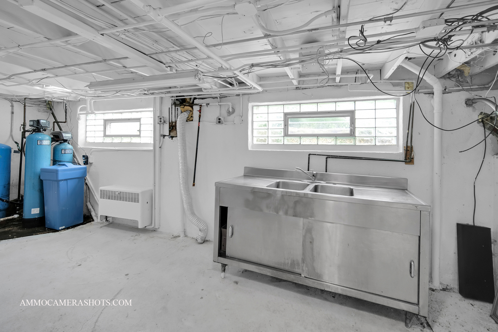 25W375 Plank Road Naperville, IL 60563 - Photo 46 of 47 a view of a room with air conditioner duct and wooden floor