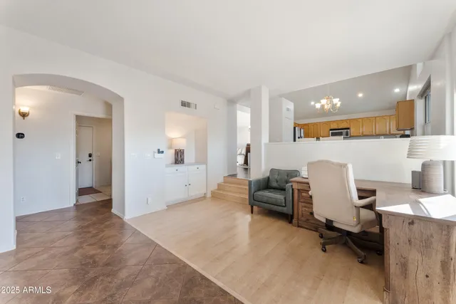 a room with furniture and a wooden floor