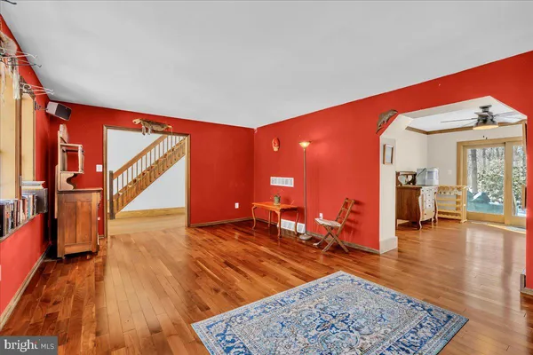 a view of a living room and dining room