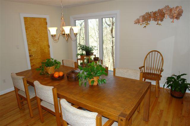 5212 Falcon Ridge Road Roanoke, VA 24018 - Photo 5 of 10 a view of a dining room with furniture and wooden floor