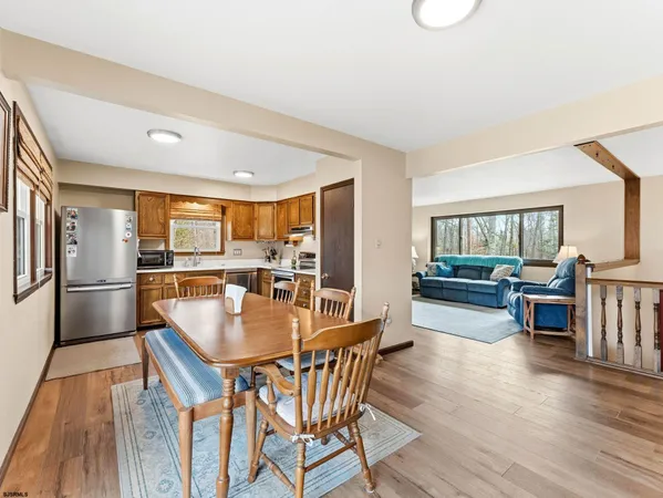 a kitchen with stainless steel appliances a stove sink and cabinets