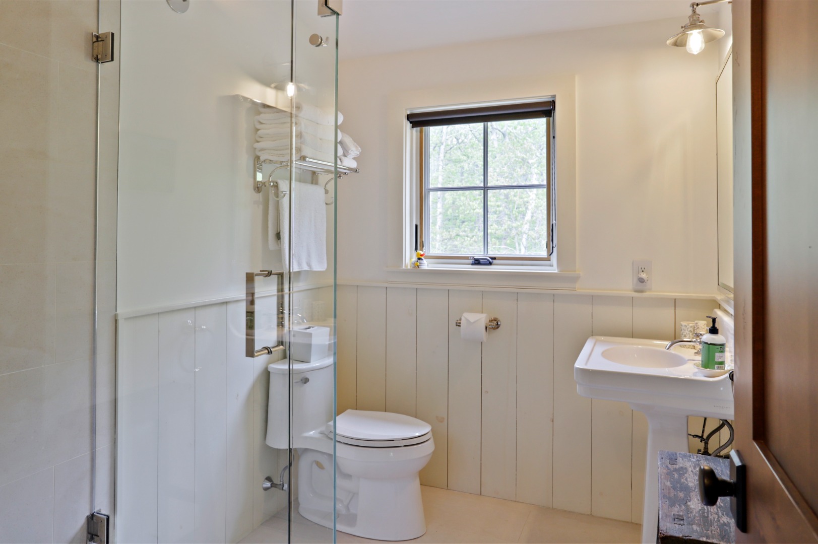 9 Ridge Hill Road Chilmark, MA 02535 - Photo 33 of 48 a bathroom with a toilet sink and shower