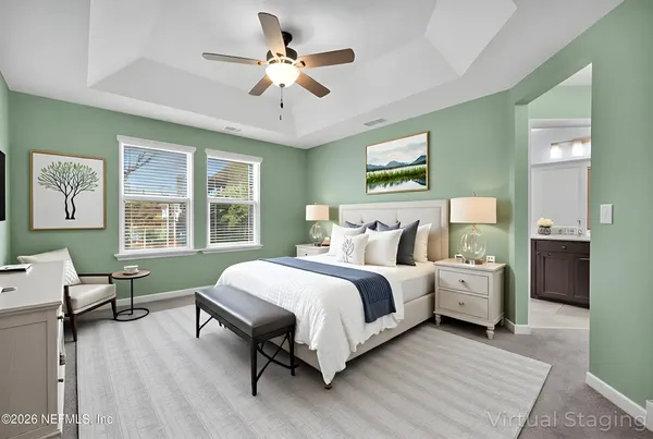 a bathroom with a double vanity sink and mirror