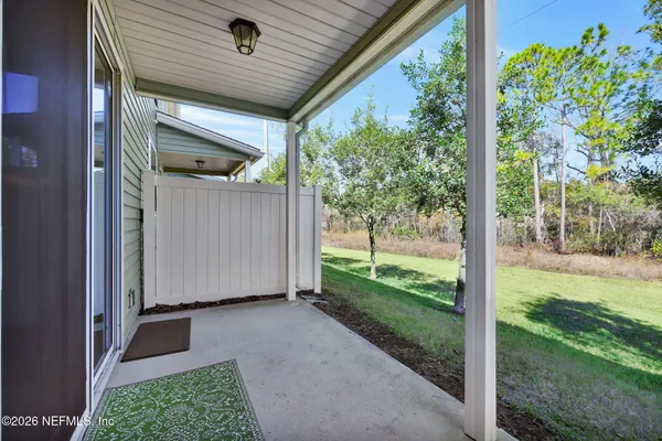 a view of a back yard of the house