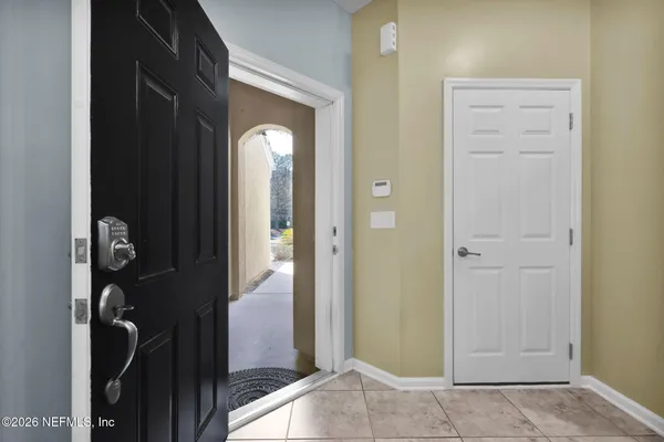 a view of entryway with wooden floor