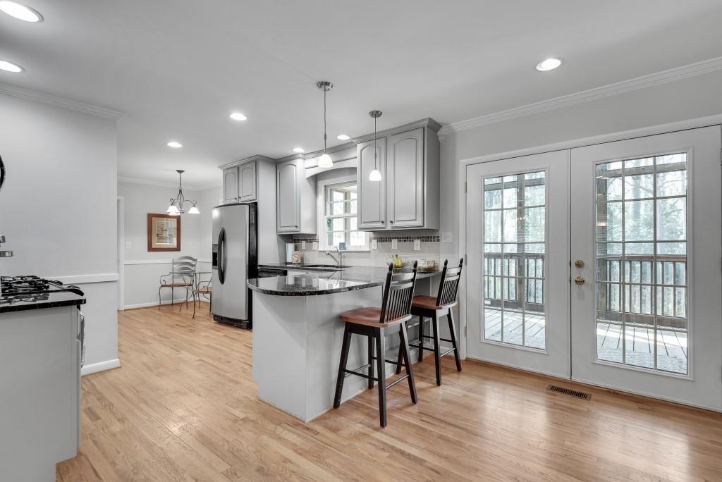 1440 Diamond Head Circle Decatur, GA 30033 - Photo 12 of 35 a view of kitchen with refrigerator and wooden floor