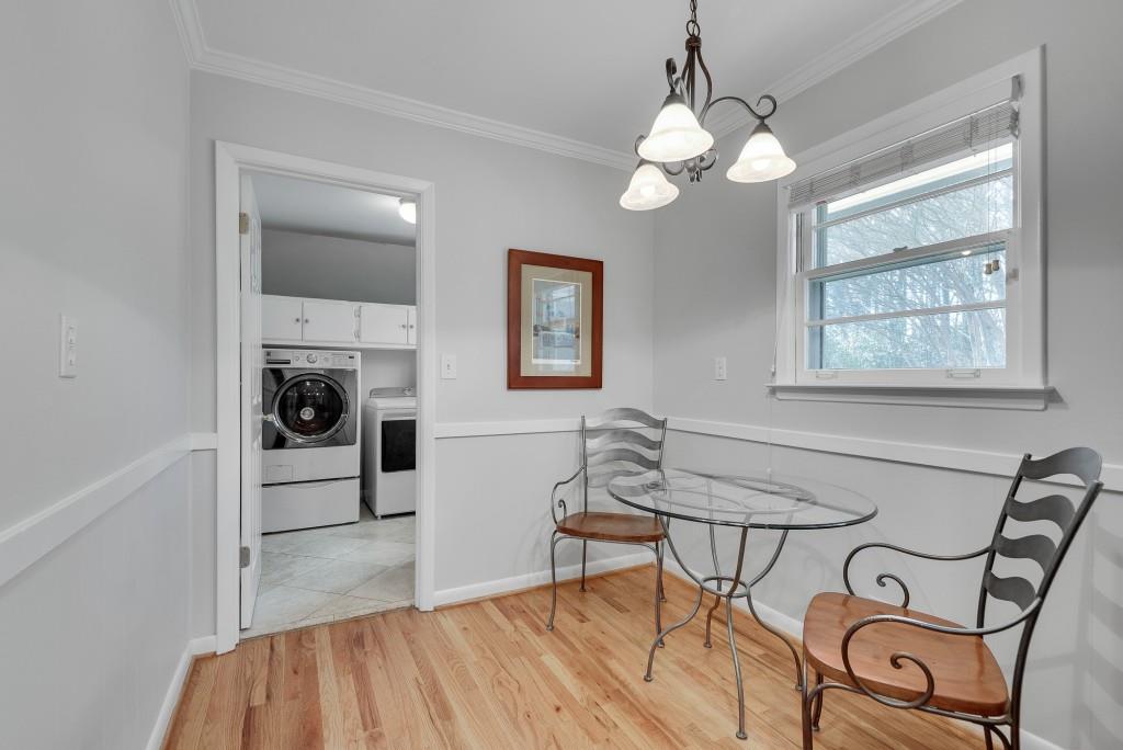 1440 Diamond Head Circle Decatur, GA 30033 - Photo 17 of 35 a view of a dining room with furniture and wooden floor