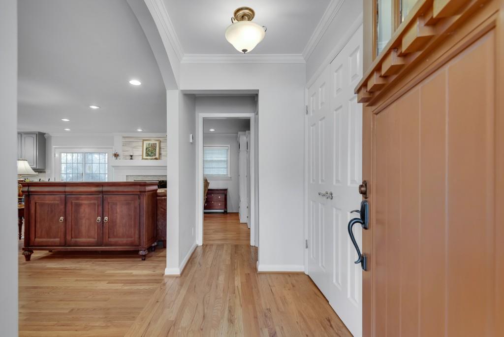 1440 Diamond Head Circle Decatur, GA 30033 - Photo 3 of 35 a view of a hallway with wooden floor and cabinet