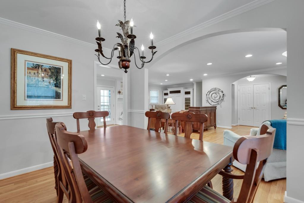 1440 Diamond Head Circle Decatur, GA 30033 - Photo 6 of 35 a view of a dining room with furniture and wooden floor