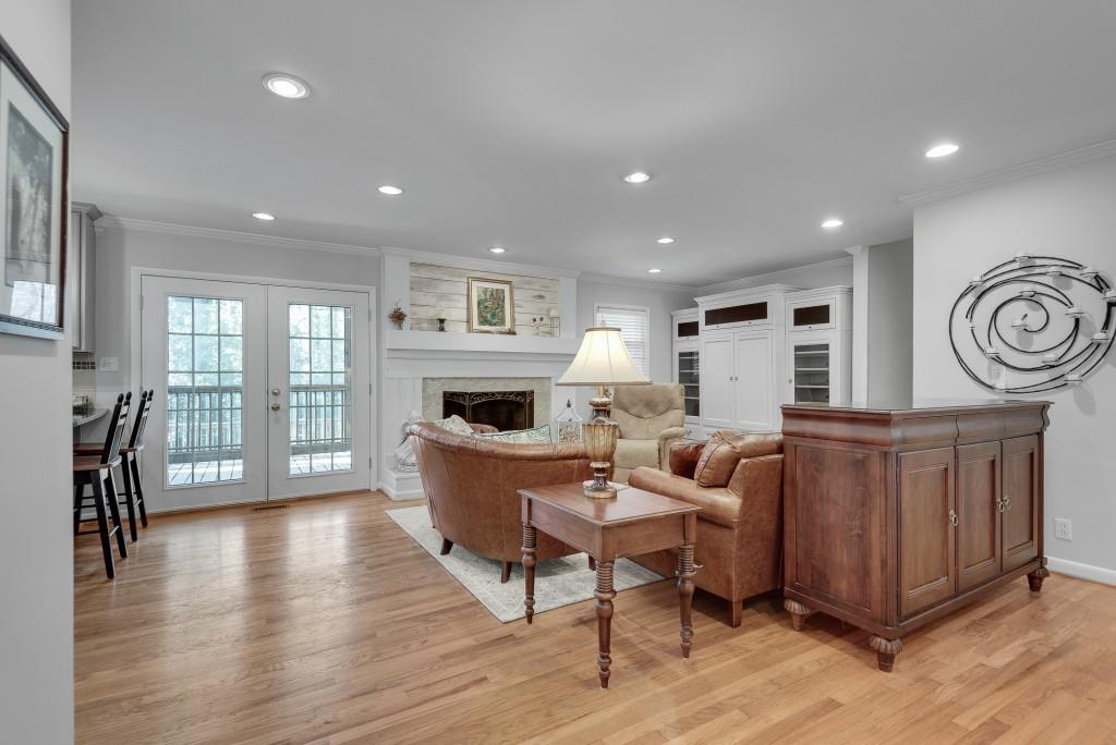 1440 Diamond Head Circle Decatur, GA 30033 - Photo 8 of 35 a living room with furniture and a fireplace