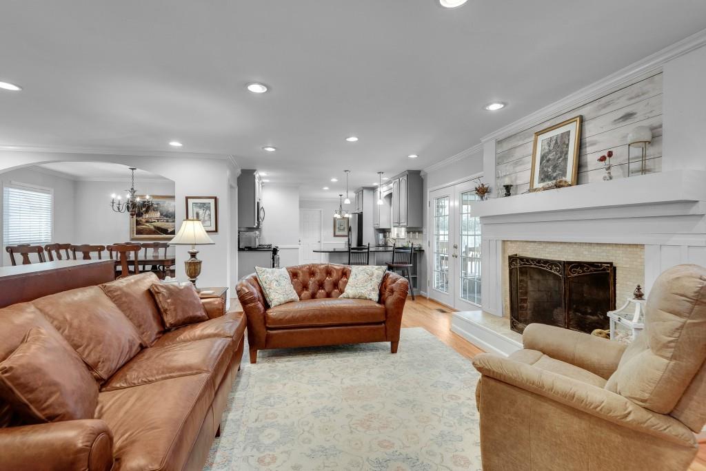 1440 Diamond Head Circle Decatur, GA 30033 - Photo 10 of 35 a living room with furniture and a fireplace