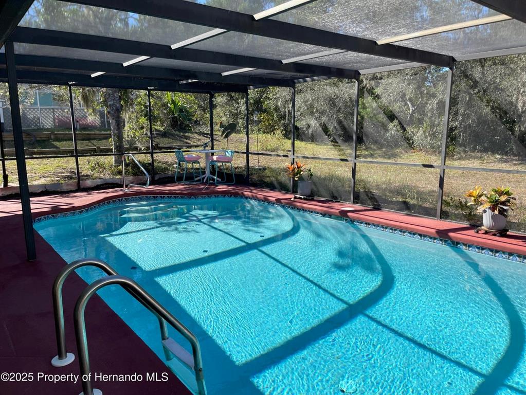 6233 Hancock Avenue Spring Hill, FL 34608 - Photo 15 of 19 a view of an indoor swimming pool