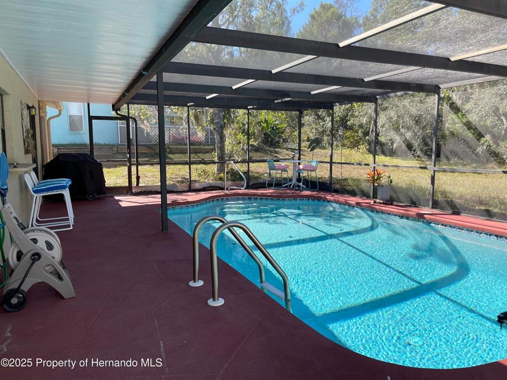 6233 Hancock Avenue Spring Hill, FL 34608 - Photo 16 of 19 a view of a room with gym equipment